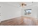 Large bedroom with tray ceiling, ceiling fan and hardwood floors; lots of natural light at 2053 Haystack Way, Myrtle Beach, SC 29579
