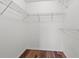 Walk-in closet shows white walls, wired shelving, and hardwood floors at 2053 Haystack Way, Myrtle Beach, SC 29579
