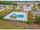 Community pool with barn clubhouse offering a recreational space for residents with swimming and relaxation at 2053 Haystack Way, Myrtle Beach, SC 29579
