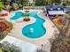 Aerial view of community pool with unique shapes and lounging areas, ideal for Gathering enjoyment and relaxation at 2053 Haystack Way, Myrtle Beach, SC 29579