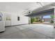 Spacious garage with epoxy floor, laundry, and an open door at 2053 Haystack Way, Myrtle Beach, SC 29579
