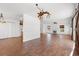 Open concept living room with modern lighting, fireplace, and wood floors at 2053 Haystack Way, Myrtle Beach, SC 29579