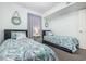 Twin bedroom with coastal decor and ample closet space at 2405 S Ocean Blvd. # 207, North Myrtle Beach, SC 29582