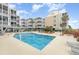 Community pool with plenty of lounge chairs at 2405 S Ocean Blvd. # 207, North Myrtle Beach, SC 29582