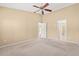 Spacious bedroom with a ceiling fan and neutral carpet, ready for your personal touch at 352 Mckendree Ln., Myrtle Beach, SC 29579