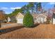 Charming home with a two-car garage, bay window, and mature landscaping at 352 Mckendree Ln., Myrtle Beach, SC 29579