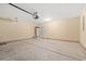 Spacious two car garage with water heater, neutral paint and smooth concrete flooring at 352 Mckendree Ln., Myrtle Beach, SC 29579
