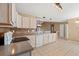 Bright eat-in kitchen features granite countertops, tile flooring, and wooden cabinetry at 352 Mckendree Ln., Myrtle Beach, SC 29579