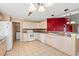 Well-lit kitchen with ample cabinet space, tile flooring, and modern appliances at 352 Mckendree Ln., Myrtle Beach, SC 29579