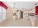Spacious kitchen featuring light-colored cabinets, tile floors, and modern appliances at 352 Mckendree Ln., Myrtle Beach, SC 29579