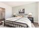Inviting bedroom featuring a comfortable bed, stylish decor, and serene lighting at 556 Duvall St., Longs, SC 29568
