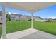 Backyard featuring a concrete patio and lush green grass, great for entertaining at 1200 Nw Calabash Station Blvd., Calabash, NC 28467