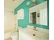 Bright bathroom with a shower and tub, white cabinet, and a mirror reflecting the door at 2925 Carriage Row Ln. # 145, Myrtle Beach, SC 29577