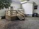 A view of the home's back deck and stairs at 306 E Godbold St., Marion, SC 29571
