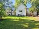 View of the backyard and back of the house, with partial view of the deck at 306 E Godbold St., Marion, SC 29571
