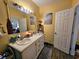 Bathroom with large vanity, double sinks, and modern lighting at 306 E Godbold St., Marion, SC 29571