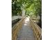 This home features a wooden ramp on the side of the house for accessibility at 306 E Godbold St., Marion, SC 29571