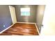 Bedroom featuring wooden floors, a window and a closet at 618 35Th Ave. N # C, Myrtle Beach, SC 29577