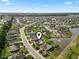 Aerial view of the residential neighborhood showcasing lush landscaping and community lakes at 1133 Spalding Ct., Surfside Beach, SC 29575