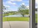 Backyard view from the patio with a water fountain and the neighborhood beyond at 1133 Spalding Ct., Surfside Beach, SC 29575
