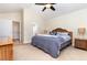 Main bedroom with king bed and ceiling fan at 1133 Spalding Ct., Surfside Beach, SC 29575