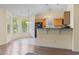 Bright kitchen with wooden cabinets, black appliances, and ample counter space at 1133 Spalding Ct., Surfside Beach, SC 29575
