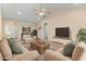 Cozy living room featuring neutral walls, comfortable seating, and a ceiling fan at 1133 Spalding Ct., Surfside Beach, SC 29575