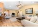 Vaulted ceiling living room with hardwood floors and comfy sofas at 1133 Spalding Ct., Surfside Beach, SC 29575