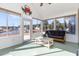 Bright sunroom with lots of windows, a decorative crab, views of the water and seating at 1133 Spalding Ct., Surfside Beach, SC 29575