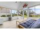 Bright sunroom with views of the backyard, water, seating, and lots of natural light at 1133 Spalding Ct., Surfside Beach, SC 29575