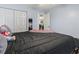 Bedroom with black bedding and a teddy bear at 2040 Chadbury Ln., Myrtle Beach, SC 29588