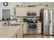 Kitchen with stainless steel appliances and light wood cabinets at 2040 Chadbury Ln., Myrtle Beach, SC 29588