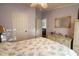 Relaxing bedroom with floral bedding and wicker furniture at 2780 Oak St., Conway, SC 29526