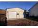 Double-door garage with window and light fixture at 2780 Oak St., Conway, SC 29526
