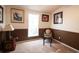 Home office with a chair and two framed pictures at 2780 Oak St., Conway, SC 29526