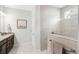 Stylish bathroom with granite countertops, dual vanity, and a modern tiled shower with glass enclosure at 3126 White Jasmine Dr., Little River, SC 29566