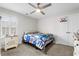 Cozy bedroom with ceiling fan, natural light, and a fun basketball hoop detail at 3126 White Jasmine Dr., Little River, SC 29566