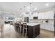 Modern, eat-in kitchen featuring a large island, stainless steel appliances, and a sleek design at 3126 White Jasmine Dr., Little River, SC 29566