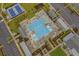 Aerial view of a community pool with surrounding lounge chairs, landscaping, and parking at 3126 White Jasmine Dr., Little River, SC 29566