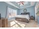 Primary bedroom with large bed and tray ceiling at 604 Mcclain Ct., Conway, SC 29526