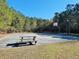 Outdoor basketball court with picnic table beside at 64 Summerlight Dr., Murrells Inlet, SC 29576