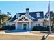 The Bays Community Center featuring classic architecture, manicured landscaping and ample parking at 64 Summerlight Dr., Murrells Inlet, SC 29576