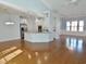 Open concept living area combining living, dining and kitchen; features hardwood flooring and contemporary design at 64 Summerlight Dr., Murrells Inlet, SC 29576