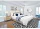 Relaxing main bedroom with tray ceilings, recessed lighting, and light neutral paint color at 64 Summerlight Dr., Murrells Inlet, SC 29576