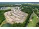 Aerial view of an expansive Primary-planned community with new construction and green space at 1217 Nw Calabash Station Blvd., Calabash, NC 28467