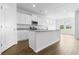 Modern kitchen featuring white cabinets, stainless steel appliances, and a center island at 1233 Nw Calabash Station Blvd., Calabash, NC 28467