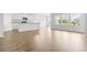 Spacious living room features hardwood floors and plenty of natural light for entertaining and relaxing at 1233 Nw Calabash Station Blvd., Calabash, NC 28467