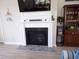 Cozy living room featuring a modern fireplace with a decorative mantel and stylish accents at 3070 Sutherland Dr., Little River, SC 29566