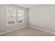 Cozy bedroom with neutral walls, modern floors, and window providing natural light at 377 Starlit Way, Myrtle Beach, SC 29579