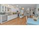 Bright kitchen featuring white cabinetry, granite countertops, stainless steel appliances, and a center island at 460 Boundary Ave., Murrells Inlet, SC 29576